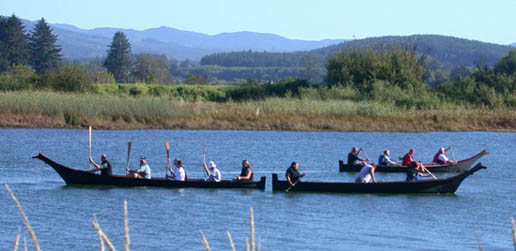 Three Chinook canoes