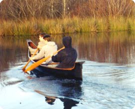 A photo of a plywood replica of a Makah canoe, stern view