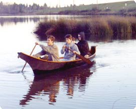 A photo of a plywood replica of a Makah canoe, bow view